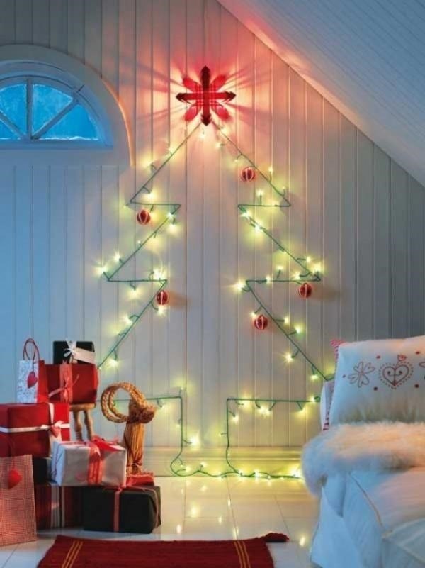 DIY Wall Christmas Tree with Lights - so simple with just the outline of the tree in lights and the star.  I LOVE it!
